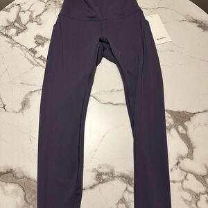 Size 6 - Lululemon Wunder Train HR Tight 25" Pockets